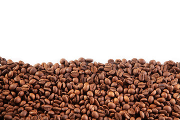  Textured brown coffee beans on a white background.