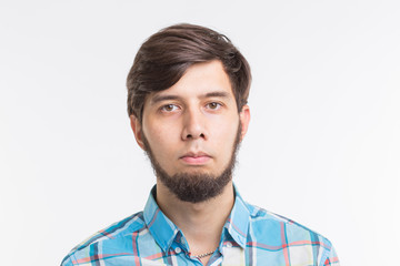 Fototapeta premium People, gesture and emotions concept - Sad bearded man on white background