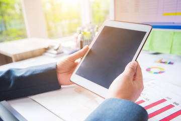 Business woman using tablet in her work at office
