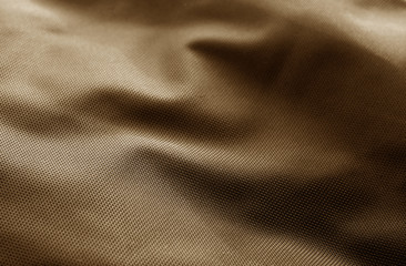 Textile texture with blur effect in brown color.