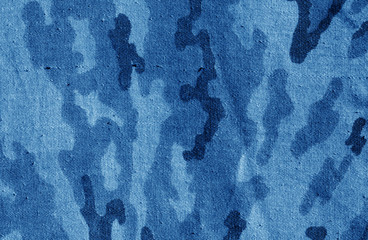 Old camouflage cloth texture in navy blue tone.