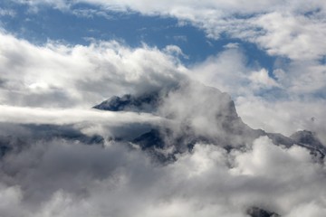 Fototapeta na wymiar Mountain Obscured By Clouds