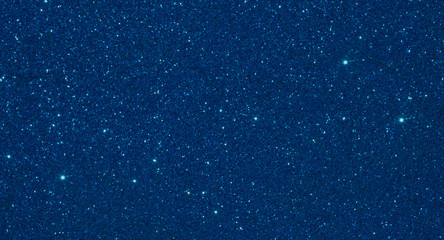 Blue background with sparkling shimmering stars