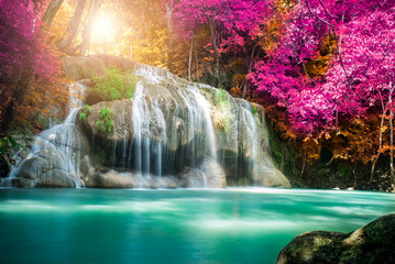 Amazing in nature, beautiful waterfall at colorful autumn forest in fall season  - obrazy, fototapety, plakaty