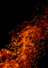 flame of fire with sparks black background