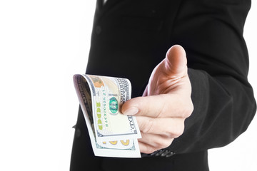 Business man holding money on white background