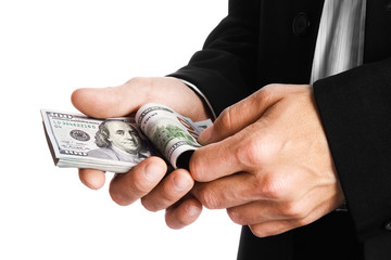 Business man holding money on white background