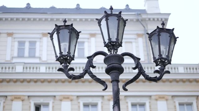 Vintage street lamp. Lanterns against beautiful european building facade.