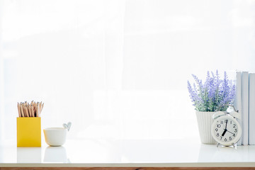 mockup white table with supplies and copy space.