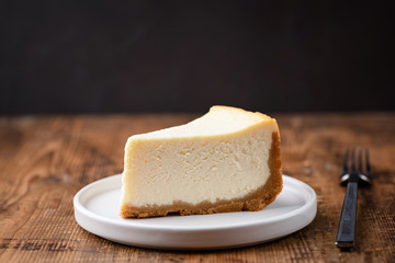 cheesecake, cake, cheese, delicious, dessert, food, slice, sweet, tasty, dark, plain, background, pastry, pie, piece, white, bakery, fresh, plate, baked, homemade, gourmet, cream, closeup, nobody, sna