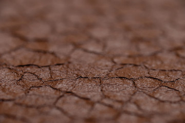 Cracked brown paint on the metal, backgrounds. Abstract background, empty template.
