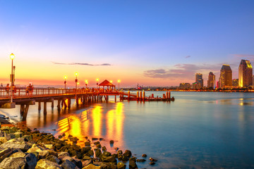 Scenic view of Coronado Ferry Landing on Coronado Island, California, USA. Downtown of San Diego at...