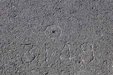 Digital sculpture on the asphalt road