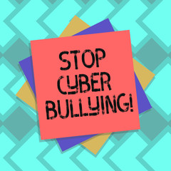 Text sign showing Stop Cyber Bullying. Conceptual photo prevent use of electronic communication bully demonstrating Multiple Layer of Blank Sheets Color Paper Cardboard photo with Shadow