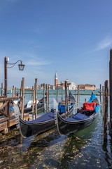 Obraz na płótnie Canvas gondola at a pier in Venice