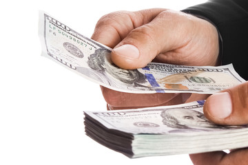 Business man holding money on white background
