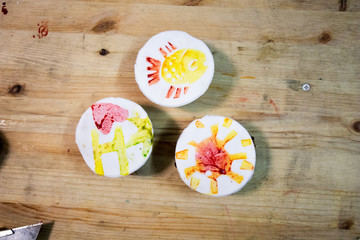 Carving potato. potatoes, colored ink, knives and paper on a wooden table to make stamps with potatoes. educational activity for children where they create a stamp by carving a potato