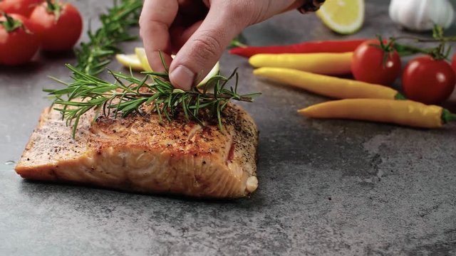 Fried salmon with aromatic herbs