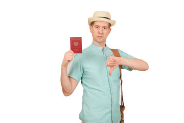 The man with the international passport in a hat and a traveling bag