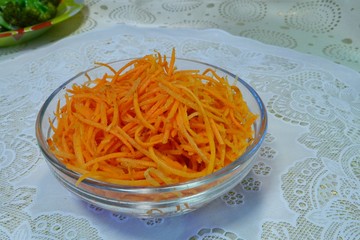 Sliced carrots in a cup on the table