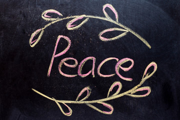 Peace text written in chalk