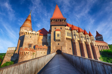 Fototapeta na wymiar Beautiful panorama of the Hunyad Castle / Corvin's Castle with wooden bridge