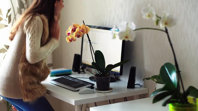 business woman workspace with orchid
