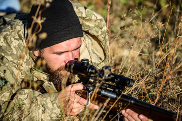 Army forces. Camouflage. Military uniform fashion. Bearded man hunter. Hunting skills and weapon equipment. How turn hunting into hobby. Man hunter with rifle gun. Boot camp. I got my eye on you