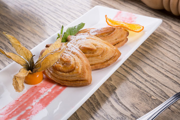 Cinnamon buns served on a plate