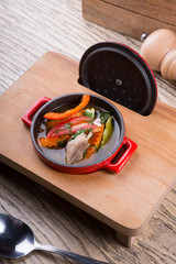 Freshly cooked beef soup in a metal pot