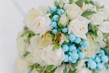 Obraz na płótnie Canvas Bouquet of flowers. The bride's bouquet. Bridal bouquet. Floristics. Wedding rings.