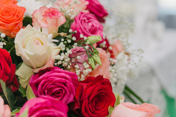 Bouquet of flowers. Multicolored roses. Bouquet of different flowers.