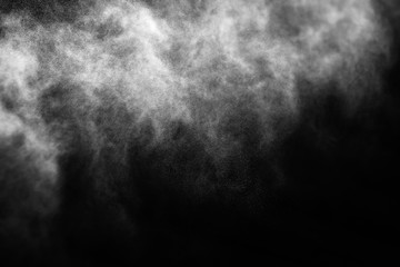 A stream of water and a cloud of drops