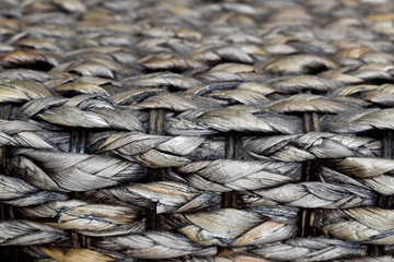 Close up shot of furniture texture made of dry seaweed