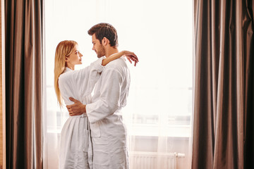 Longtime relationships. Young couple travel together hotel room leisure