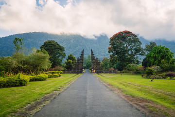 Fototapeta na wymiar Landscape with tradition Balinese gate and mountains in Bali