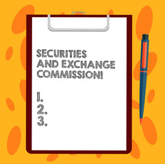 Writing note showing Securities And Exchange Commission. Business photo showcasing Safety exchanging commissions financial Sheet of Bond Paper on Clipboard with Ballpoint Pen Text Space