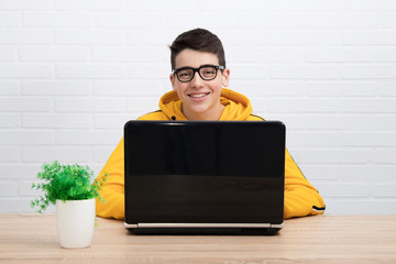 young teenager or student with laptop