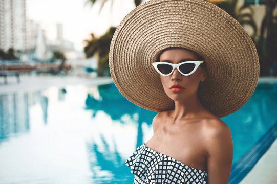 Beautiful  woman in swimming pool
