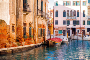 Old houses Venice, Italy along banks Grand Canal turquoise water