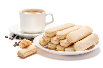 White ceramic cup of coffee with a savoiardi ladyfinger cookie on a plate