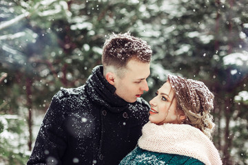 Wedding romantic couple in winter hugging outdoors in park. Love, happiness, beauty, wedding concept