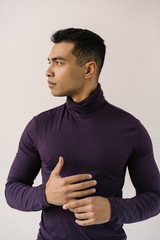 Portrait of serious business man thinking about start up project. Handsome African American fashion...
