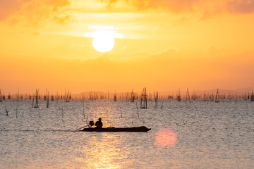 Sky orange light And fisherman boat