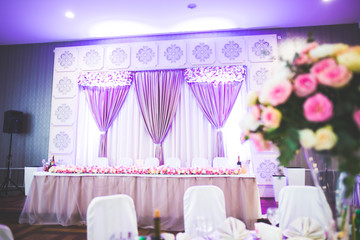 Interior of a restaurant prepared for wedding ceremony