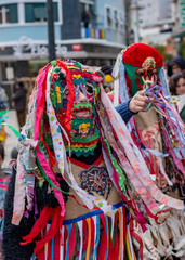 Fototapeta premium Colourful dressed masked men in the Carneval in Bragança, Portugal
