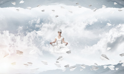 Young woman keeping mind conscious.