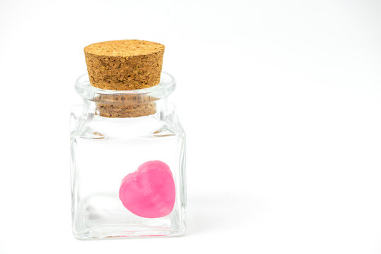 Candy heart shape in a cute glass container and close with bottle cork