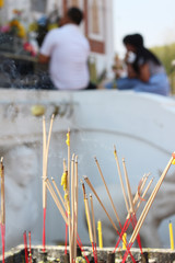 Incense candles at the point of worship.