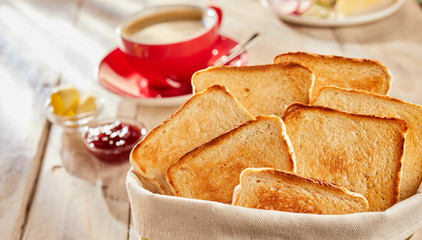 Fresh toasts for breakfast with butter coffee
